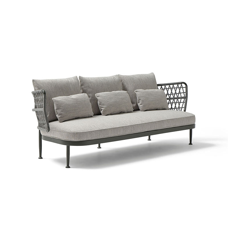Stylish outdoor sofa with a woven metal frame and plush, neutral-toned cushions, offering a comfortable and modern seating option for any outdoor living space.