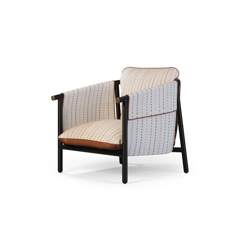 A black and white striped modern armchair with wooden frame and cushioned seat.